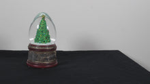 Load and play video in Gallery viewer, The Polar Express Collectible Bronze Christmas Tree Snow Globe
